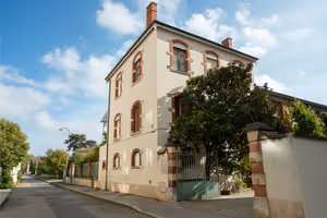 Facade of Manufacture Prelle in Lyon, historic stone building