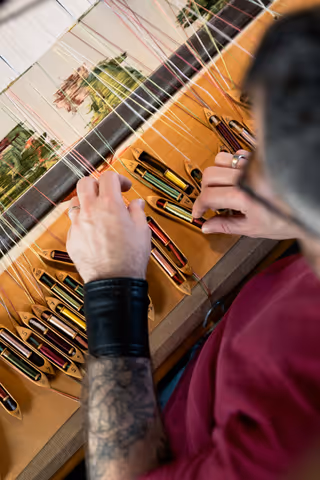 Weaver on Hand Looms